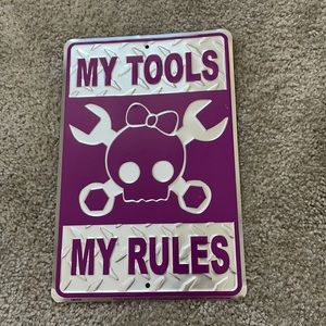 “My tools my rules” door sign